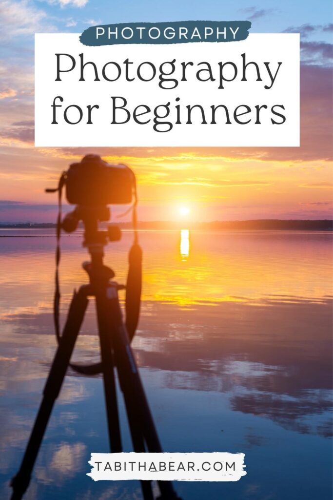 Photo of a camera on a tripod taking a photo of the sunset. Text above reads "Photography for Beginners."