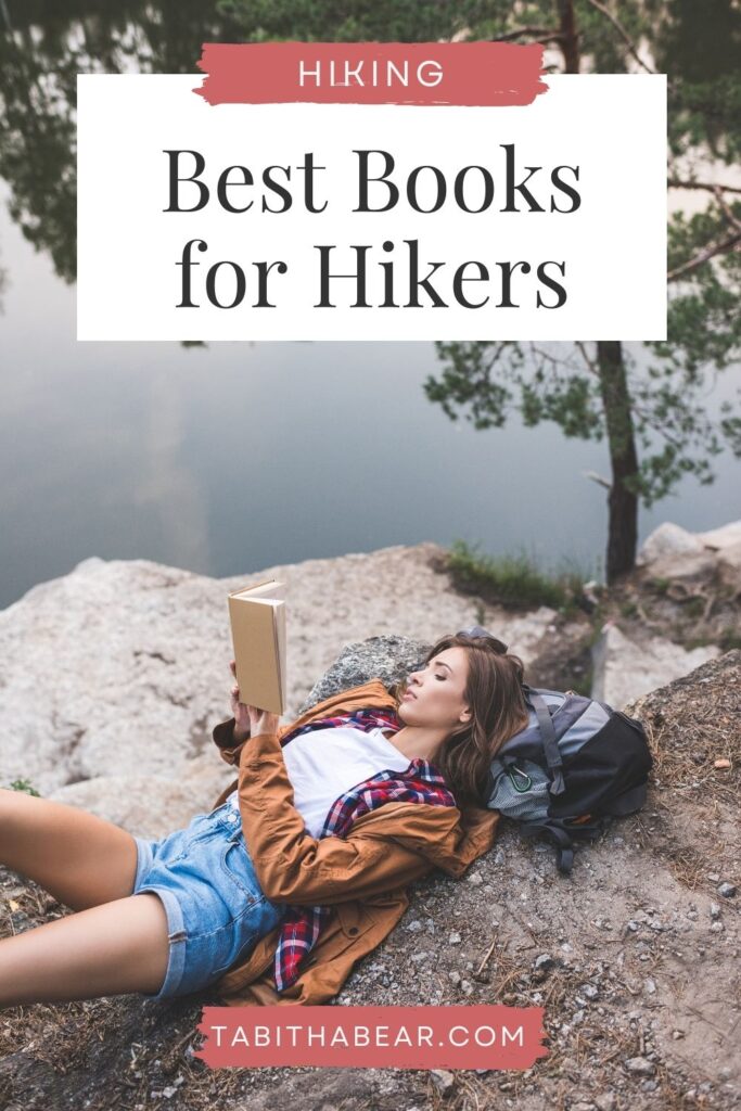 Photo of a woman lounging at the top of a mountain after a hike, reading a book. Text above the photo reads "Best Books for Hikers."